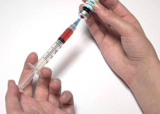 Syringe with a vaccine